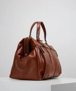 Fossil Homme DEFENDER FRAMED DUCOGNAC Sac De Voyage Cognac -Fossil Soldes 2022 03ee46b0a66e458da0eb841b47002c9a